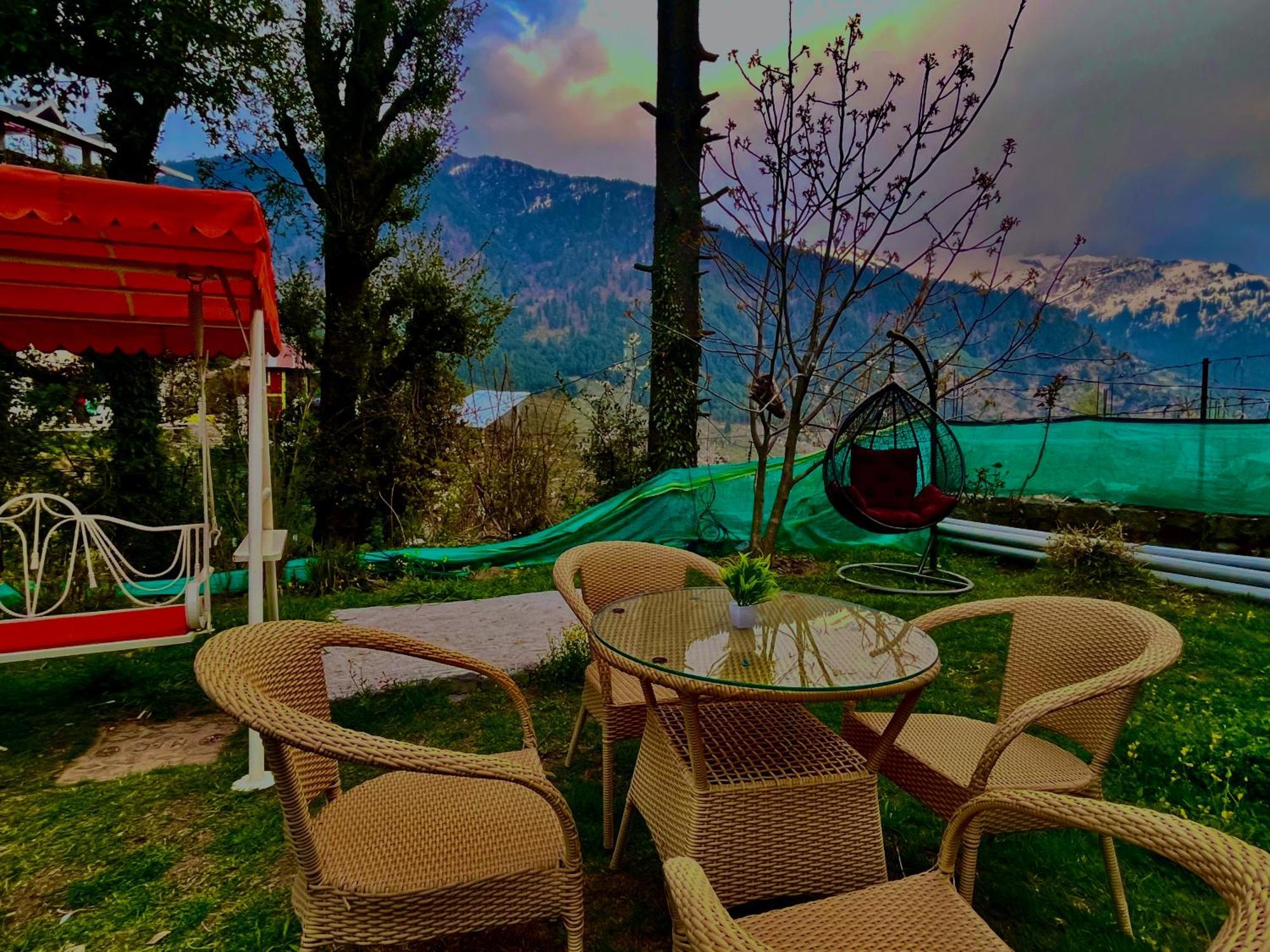 The Manu Emerald # Farmhouse # Top Selling Cottage In Manali # Peaceful Heritage Cozy Stay # Lawn With Bonfire # Most Awarded Exterior photo
