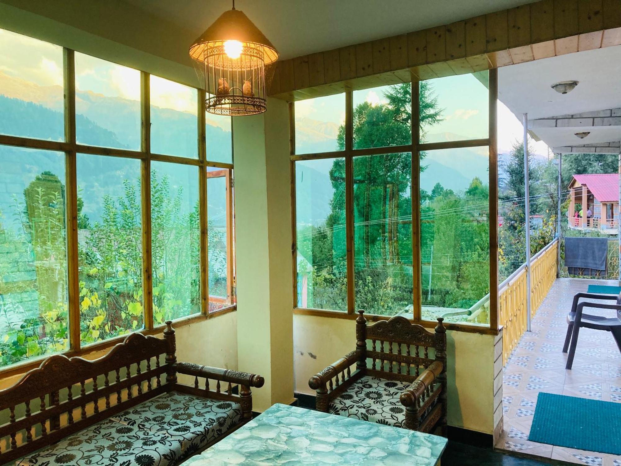The Manu Emerald # Farmhouse # Top Selling Cottage In Manali # Peaceful Heritage Cozy Stay # Lawn With Bonfire # Most Awarded Exterior photo
